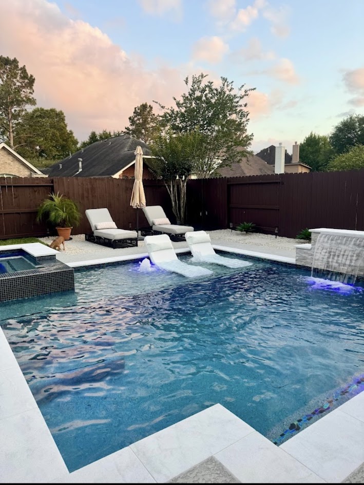 Custom pool and spa build with stonescape travertine deck, Katy TX